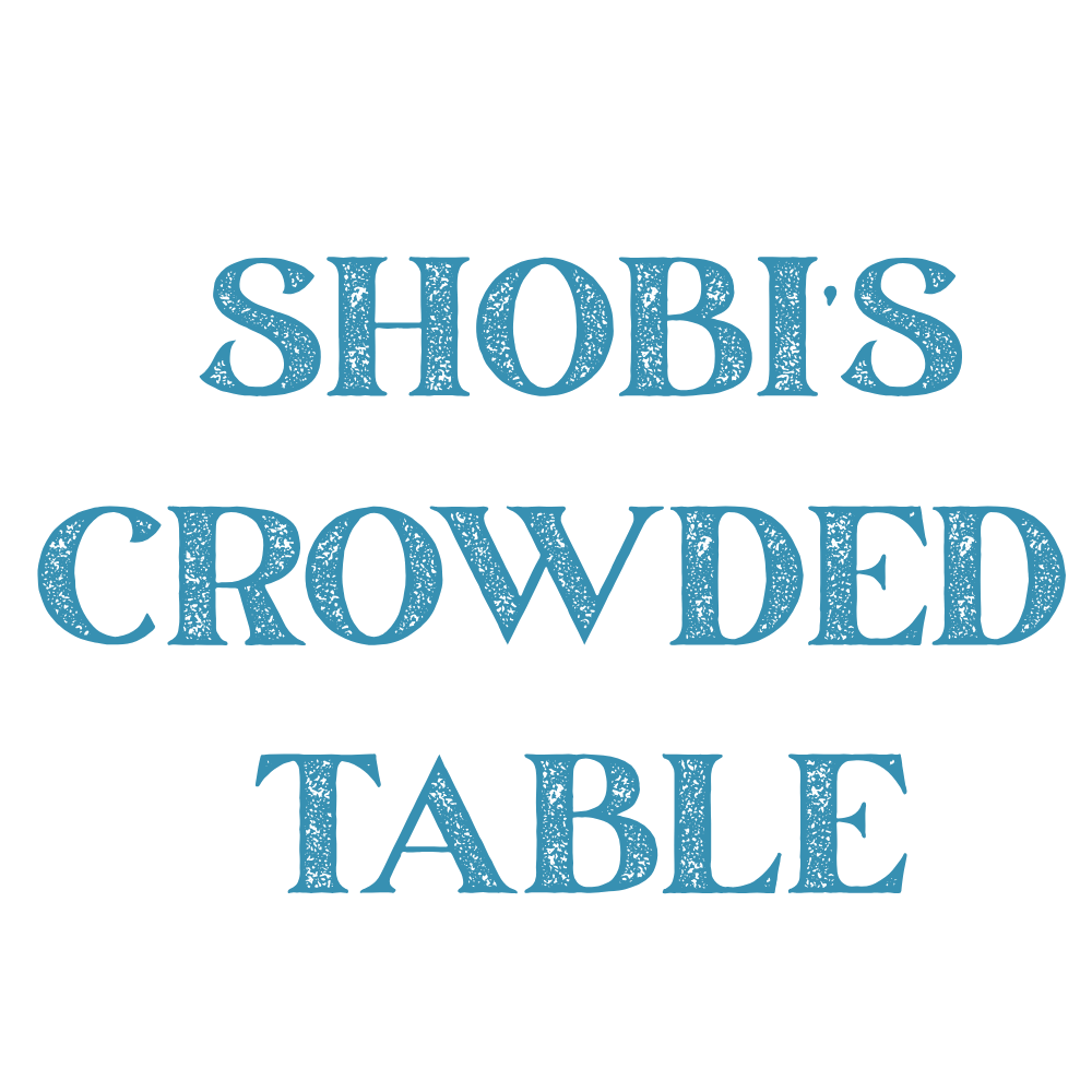 Shobi%E2%80%99s%20crowded%20table%20logo%20(3).png